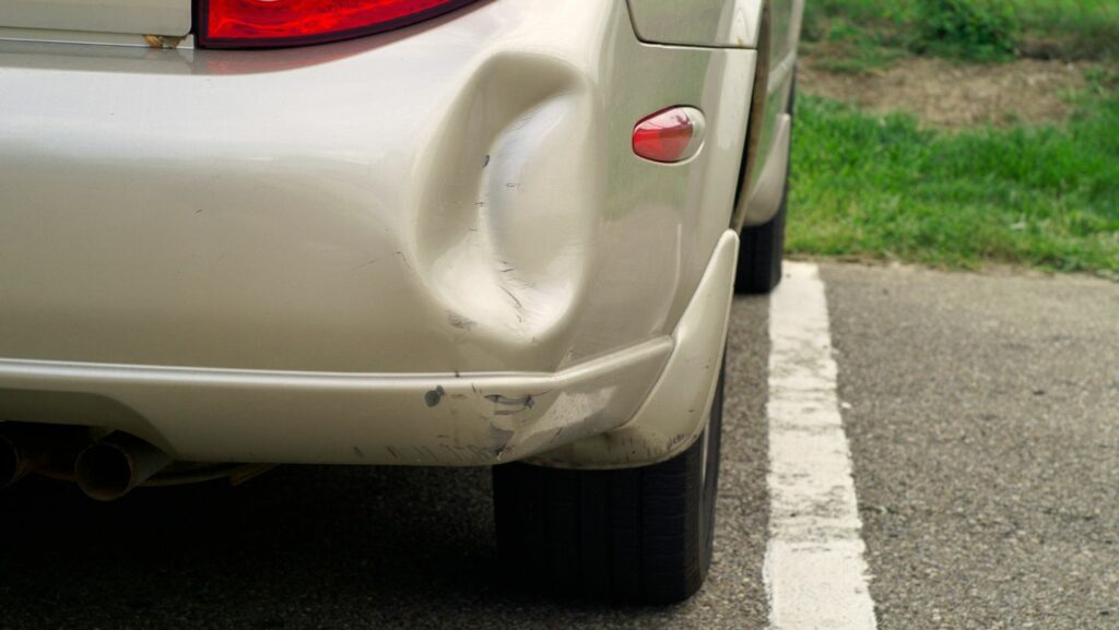 how to pull a dent out of a plastic bumper